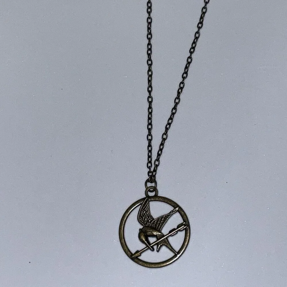 HUNGER GAMES Katniss Mockingjay Pendant Necklace Officially Licensed 2012 NEW